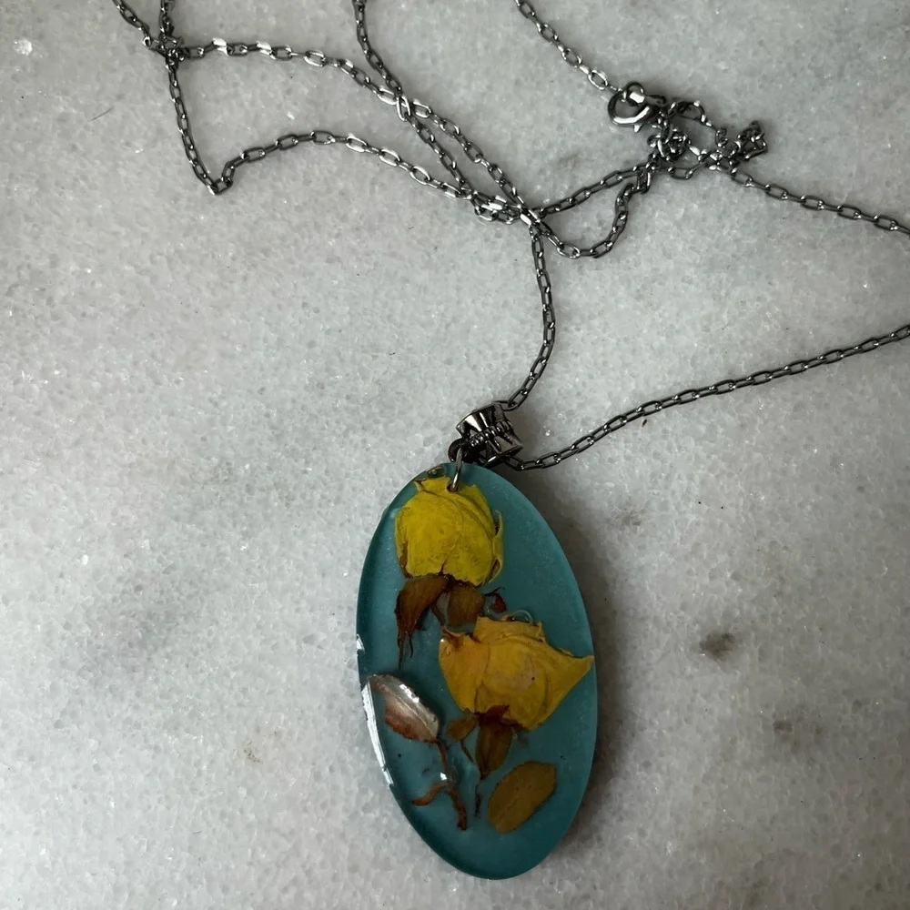 Elegant Silver Necklace with Yellow Floral Pendant